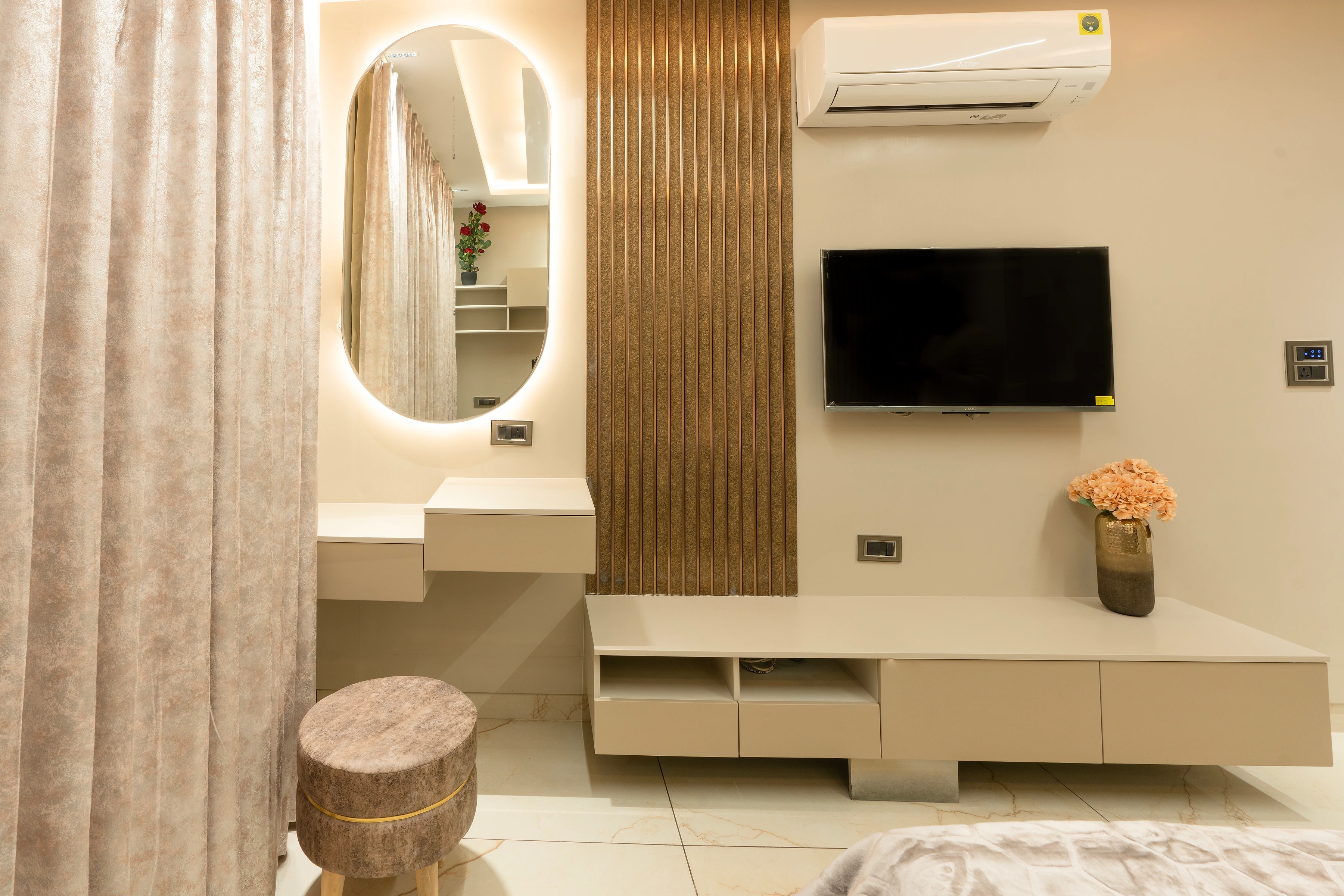 Vanity wall and media unit in the bedroom